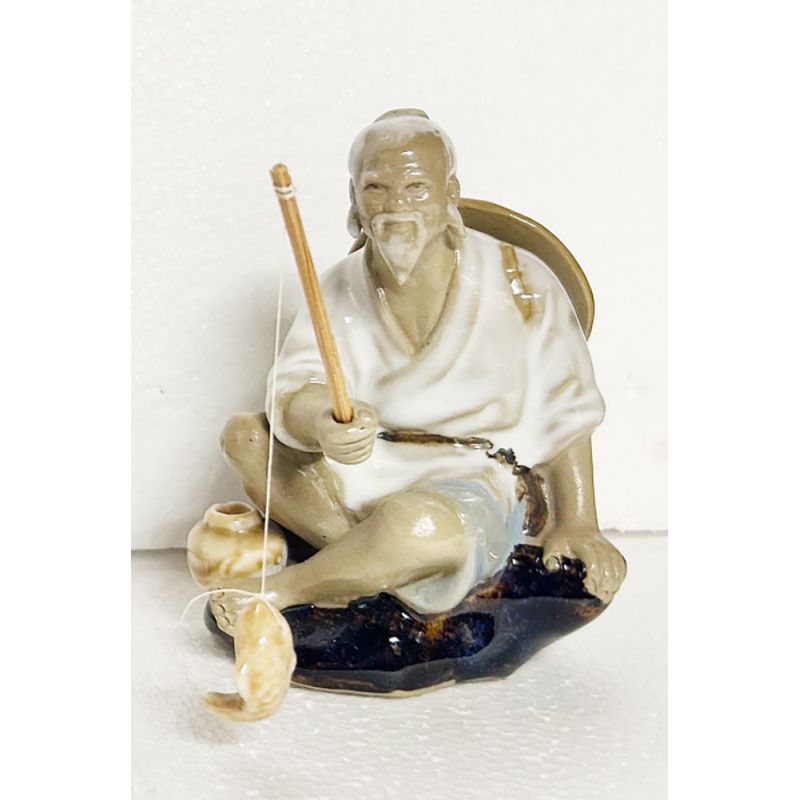 Pêcheur vietnamien en pierre 