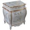 Petite commode laquée galbée.